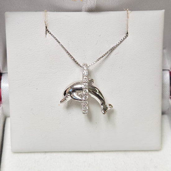 14K white gold dolphin pendant with 0.18ct round diamonds, weighing 2.4g, from Chique Jewelry.