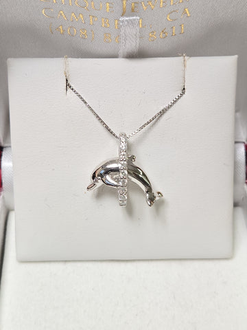 14K white gold dolphin pendant with 0.18ct round diamonds, weighing 2.4g, from Chique Jewelry.