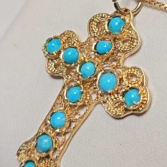 18K gold cross pendant with round turquoise stones from Chique Jewelry, weighs 2.7g, elegant jewelry accessory