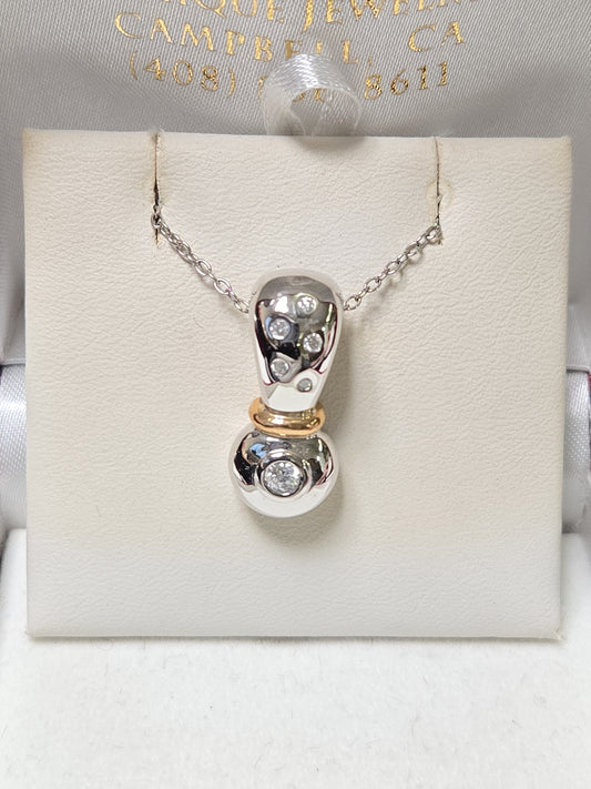 14K white gold pendant with a 0.17ct round diamond, featuring elegant design by Chique Jewelry.