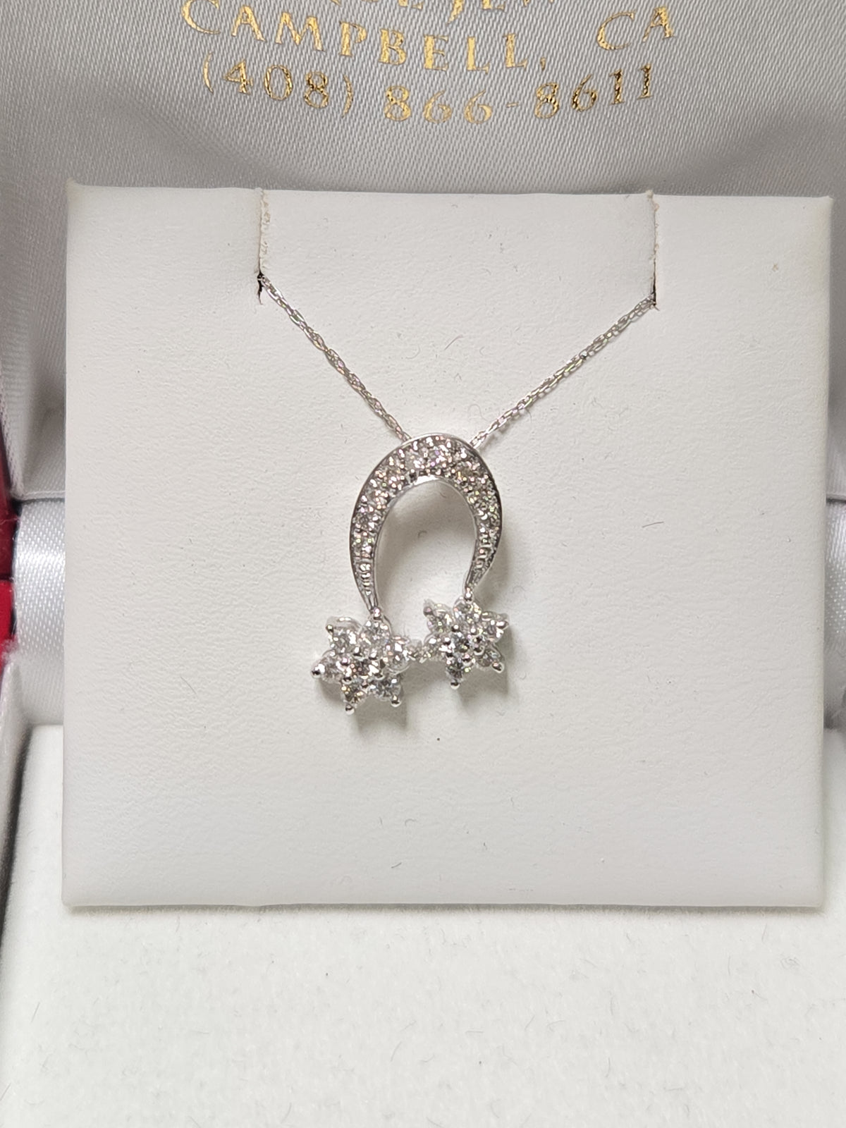 14K white gold pendant with 0.44ct round diamond, featuring elegant design from Chique Jewelry.