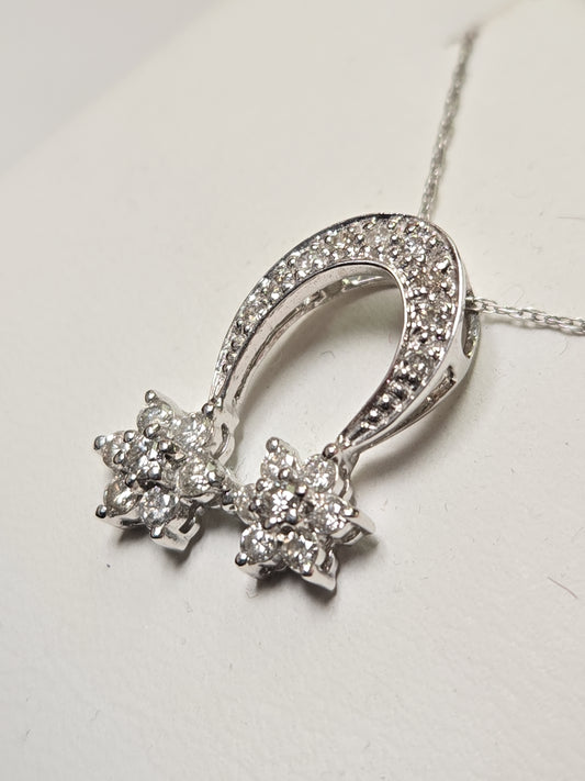 14K white gold pendant with 0.44ct round diamond, featuring elegant jewelry design, weighing 1.5 grams.