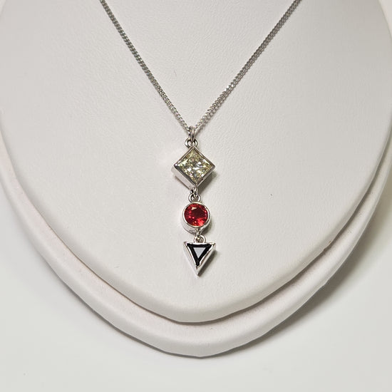 14K white gold pendant necklace with a 0.49ct princess-cut diamond, weighing 2.1g, from Chique Jewelry.