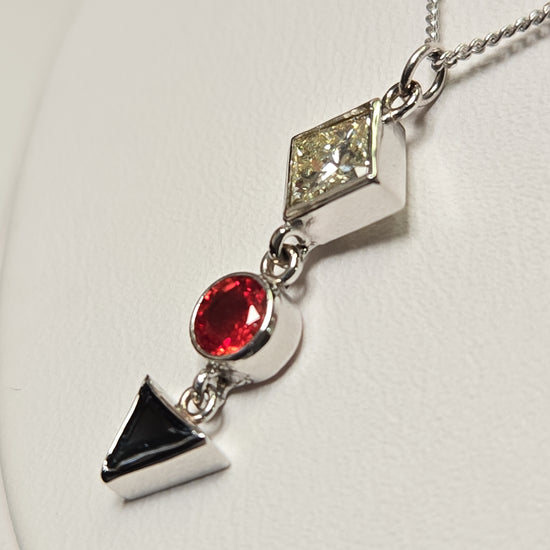 14K white gold pendant necklace with a 0.49ct princess-cut diamond, 2.1g, by Chique Jewelry.