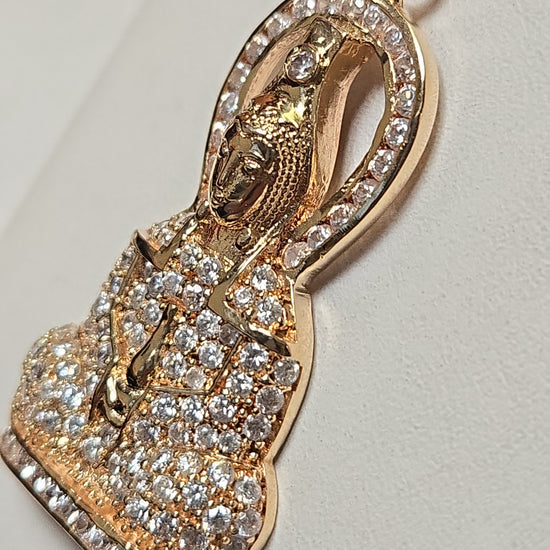 14K gold pendant with round cubic zirconia, weighing 7.9 grams, from Chique Jewelry, featuring a sparkling gemstone design.