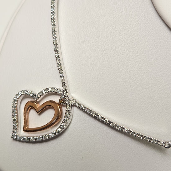 14K white gold heart pendant with 0.19ct round diamond, elegant jewelry piece from Chique Jewelry.