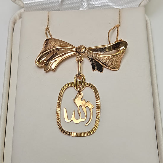 18K gold Allah brooch by Chique Jewelry, featuring intricate Islamic design, weighing 3.7 grams.