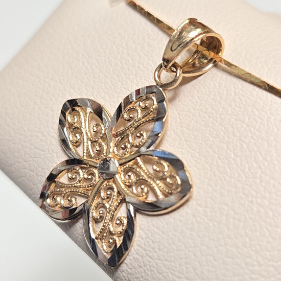 14K gold filigree flower pendant with delicate design, weighing 0.7g, crafted by Chique Jewelry.