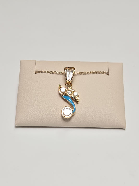 18K gold pendant with cubic zirconias by Chique Jewelry, showcasing a sparkling, elegant jewelry piece with intricate design.