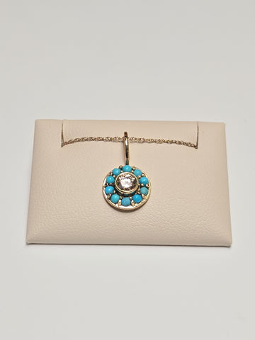 14K gold pendant with round simulated diamond, weighing 1.2g, featuring a sparkling jewelry design by Chique Jewelry.