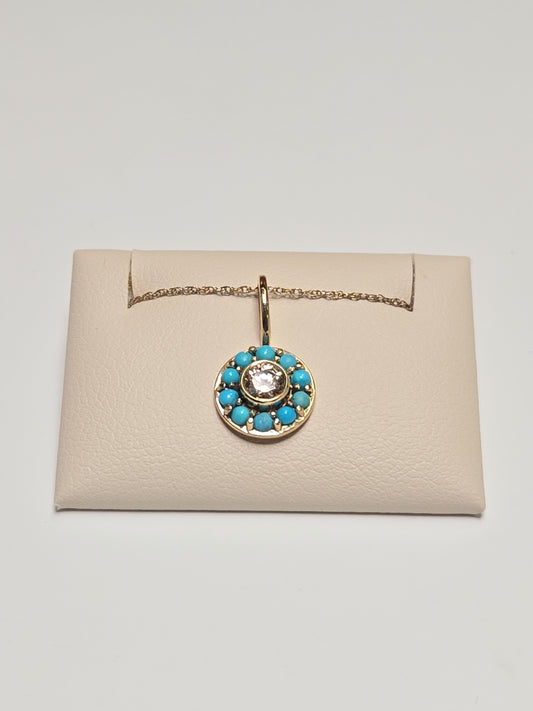 14K gold pendant with round simulated diamond, weighing 1.2g, featuring a sparkling jewelry design by Chique Jewelry.