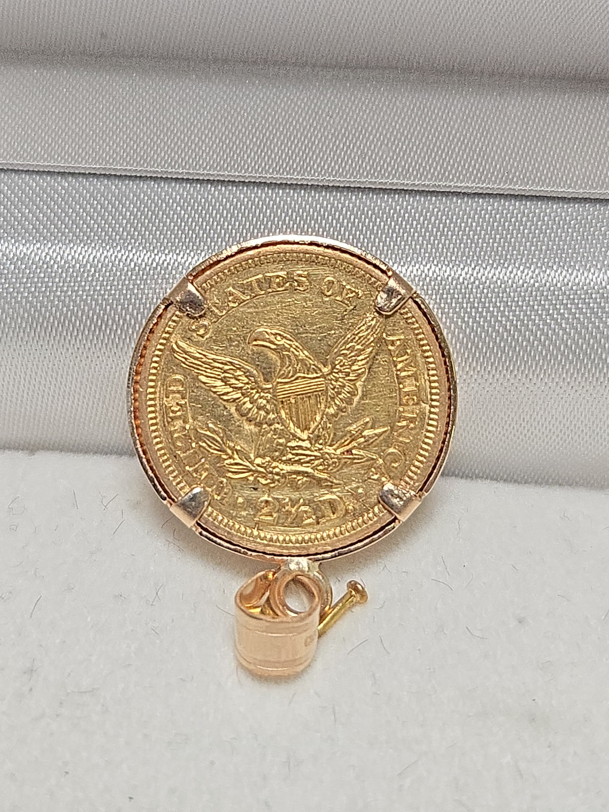 14K gold Liberty Head Quarter Eagle coin pendant by Chique Jewelry, showcasing a detailed 1845 gold coin design.