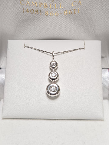 14K white gold pendant with 0.2ct round diamonds, showcasing a delicate jewelry piece from Chique Jewelry.