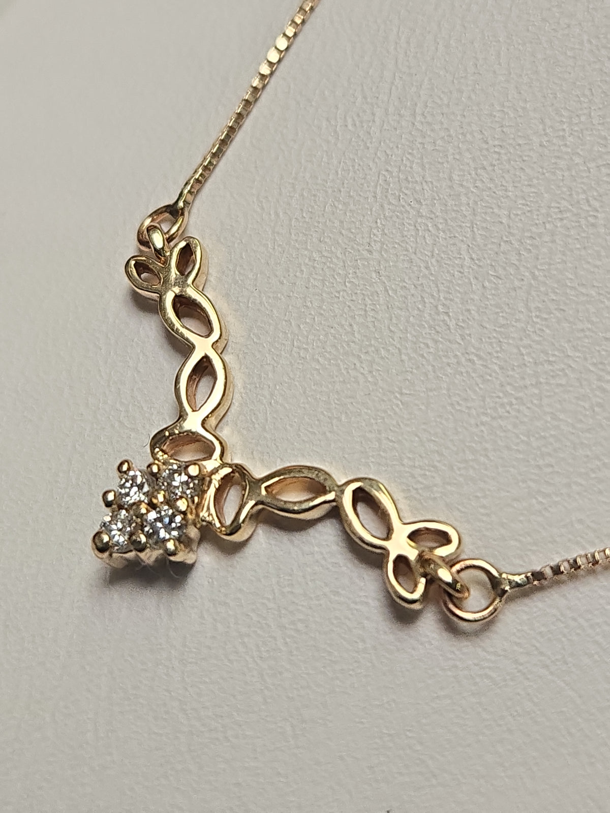 14K gold box chain necklace with round diamond pendant, 16 inches, from Chique Jewelry, showcasing a 0.08ct diamond design.