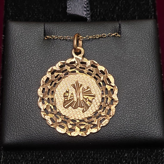 18K gold Allah pendant from Chique Jewelry, weight 2.8g, featuring intricate Islamic design and polished finish.