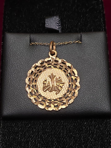 18K gold Allah pendant from Chique Jewelry, weight 2.8g, featuring intricate Islamic design and polished finish.