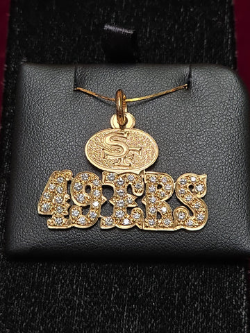 14K gold 49ers pendant with 1.1ct round diamond, crafted by Chique Jewelry, featuring a detailed sports team design.