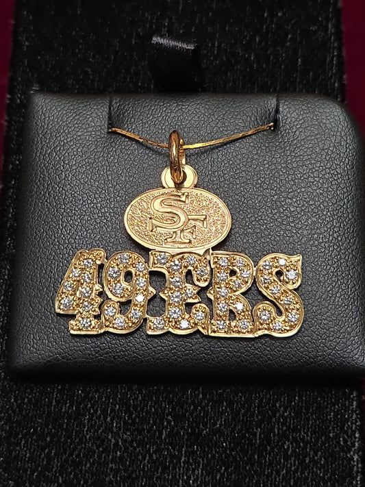 14K gold 49ers pendant with 1.1ct round diamond, crafted by Chique Jewelry, featuring a detailed sports team design.