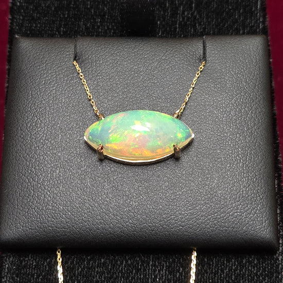 14K gold diamond cut cable chain necklace with 4.5ct marquise opal pendant, 18-inch length, by Chique Jewelry.
