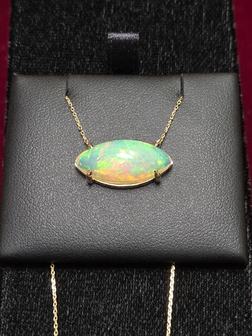 14K gold diamond cut cable chain necklace with 4.5ct marquise opal pendant, 18-inch length, by Chique Jewelry.