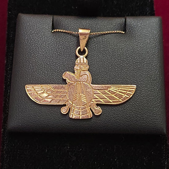 18K gold Farvahar pendant by Chique Jewelry, featuring intricate design, weighs 4.4 grams, displayed on a chain.