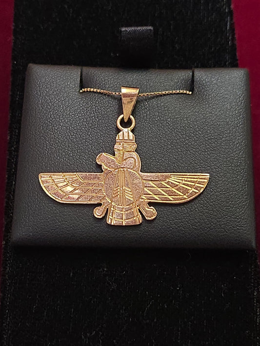 18K gold Farvahar pendant by Chique Jewelry, featuring intricate design, weighs 4.4 grams, displayed on a chain.