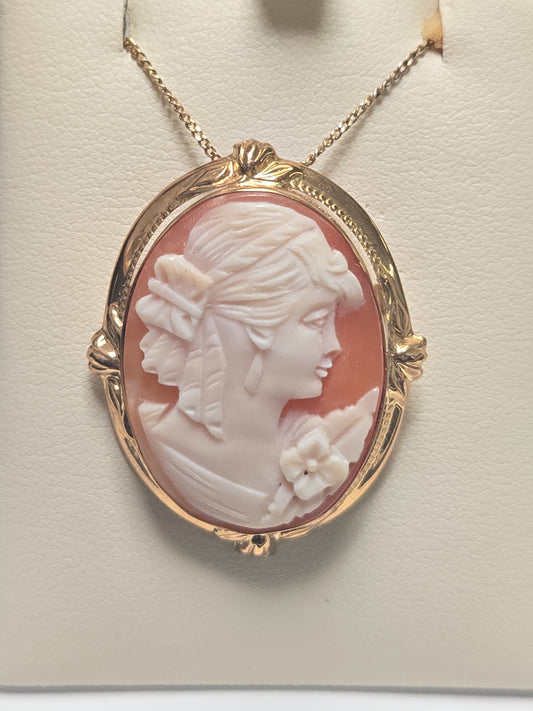 14K gold cameo brooch pendant with intricate carved cameo design, weighing 6.7 grams, from Chique Jewelry.