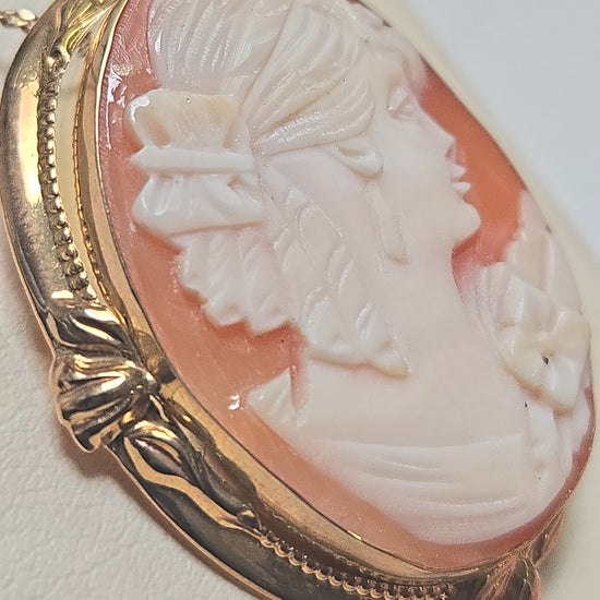 14K gold cameo brooch pendant with detailed carved cameo design, weighing 6.7 grams, by Chique Jewelry.