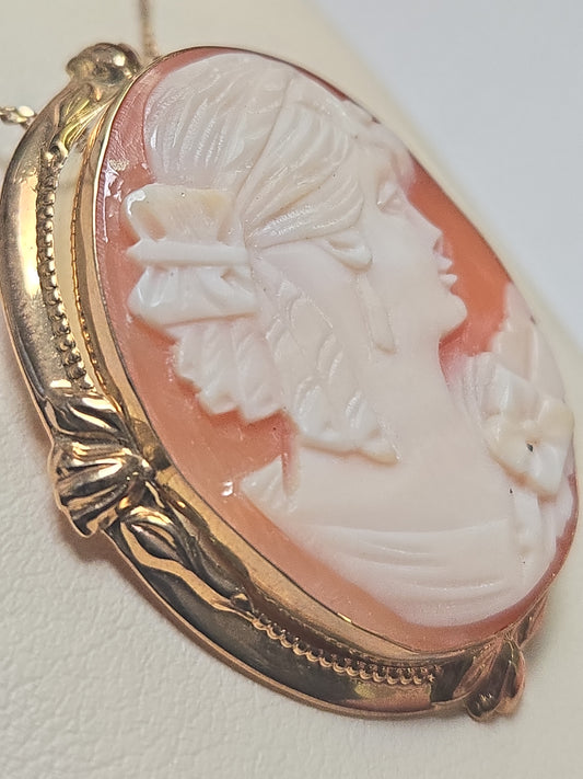 14K gold cameo brooch pendant with detailed carved cameo design, weighing 6.7 grams, by Chique Jewelry.