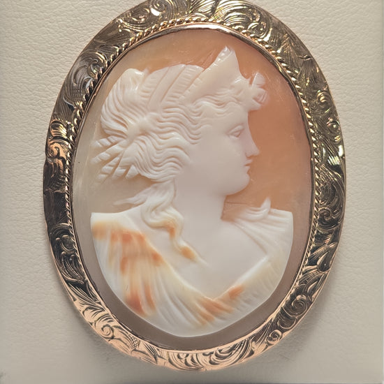 14K gold cameo brooch pendant with intricate carved profile, weighing 10g, by Chique Jewelry, showcasing elegant vintage craftsmanship.