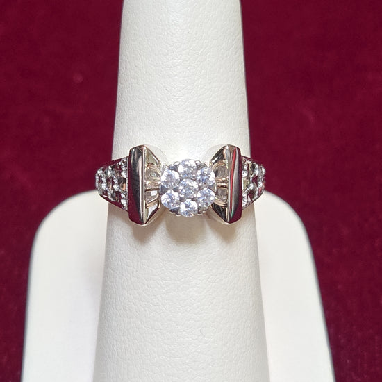 18K white gold cluster ring with round cubic zirconia stones, elegant jewelry piece from Chique Jewelry.