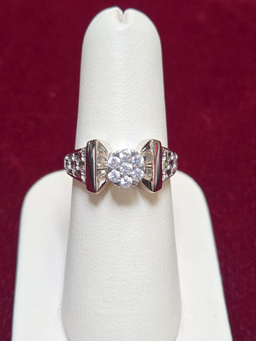 18K white gold cluster ring with round cubic zirconia stones, elegant jewelry piece from Chique Jewelry.