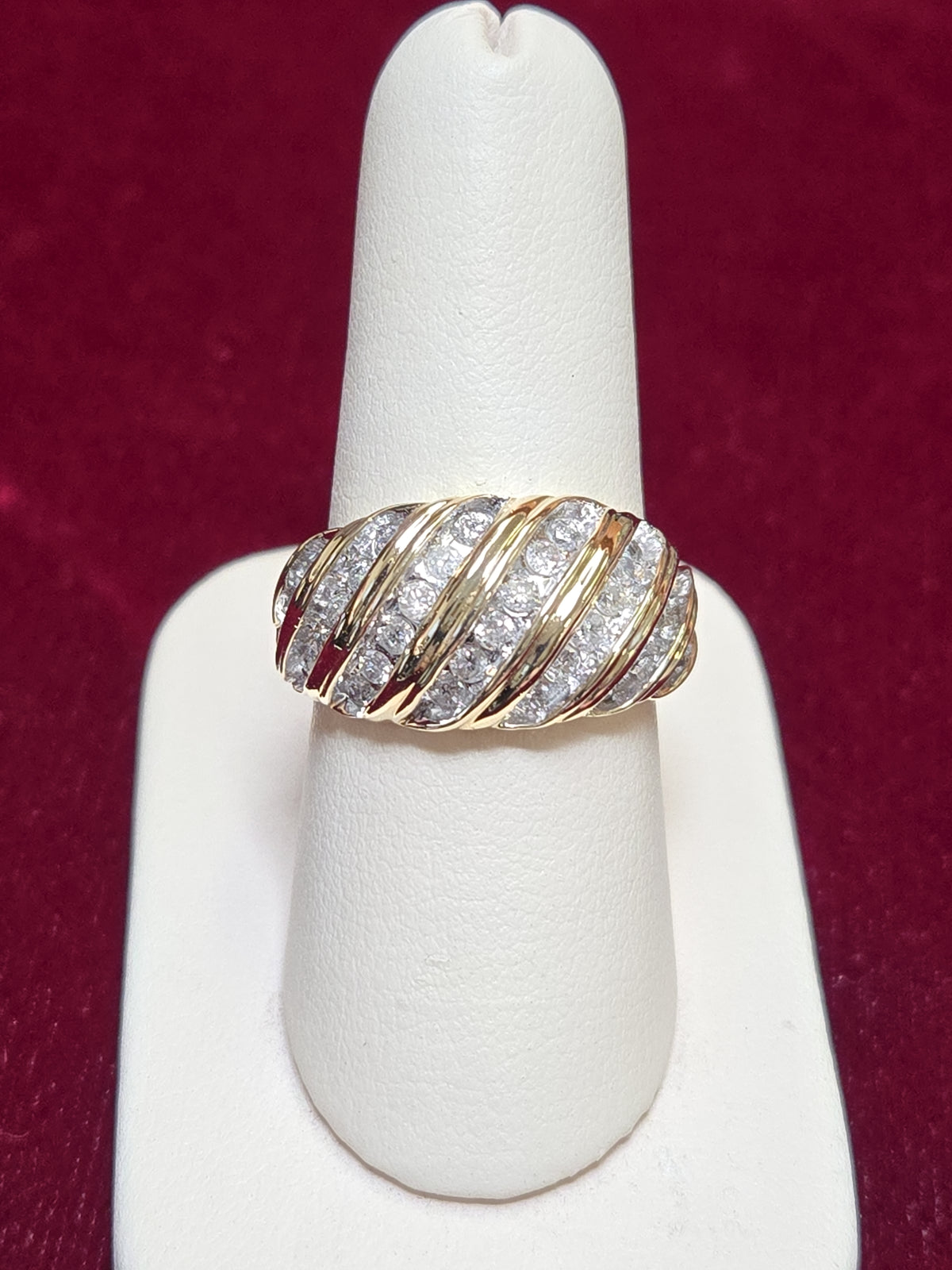 10K gold ring with 0.85ct round diamonds and a sleek design, weighing 6.3 grams, from Chique Jewelry.