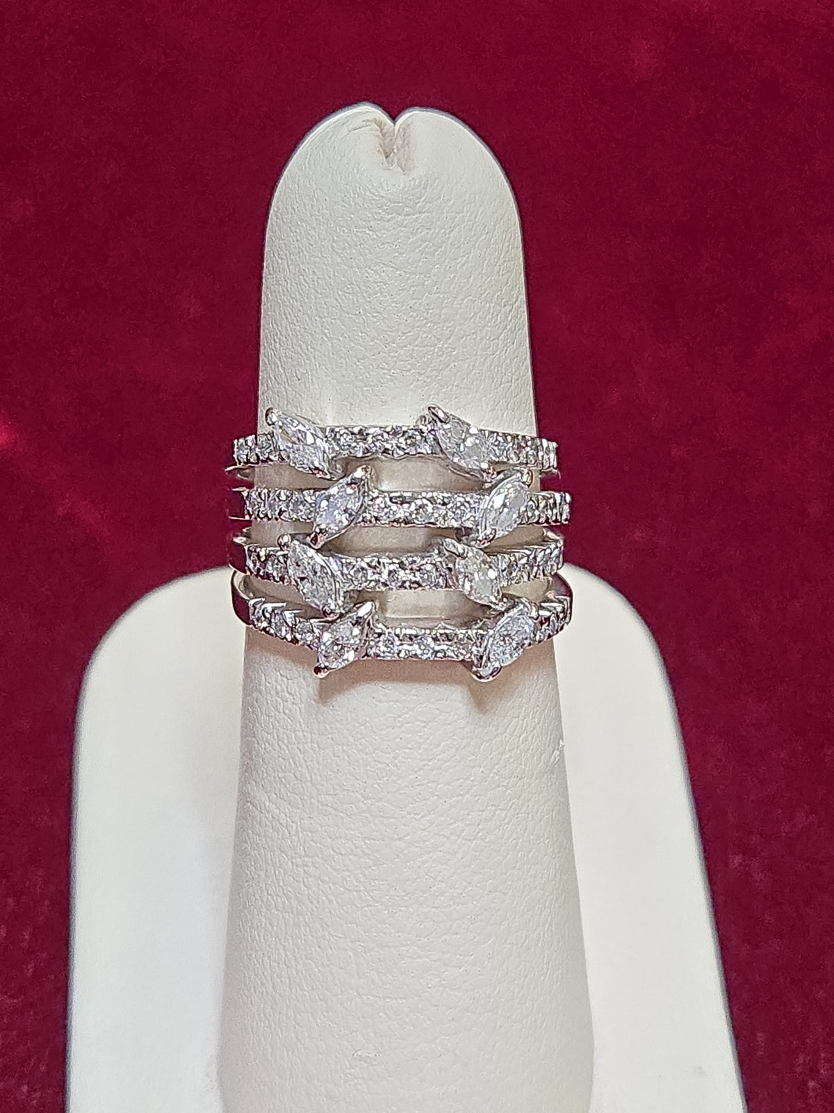 18K white gold ring with 1ct marquise diamonds, featuring elegant design and 7.9g weight by Chique Jewelry.