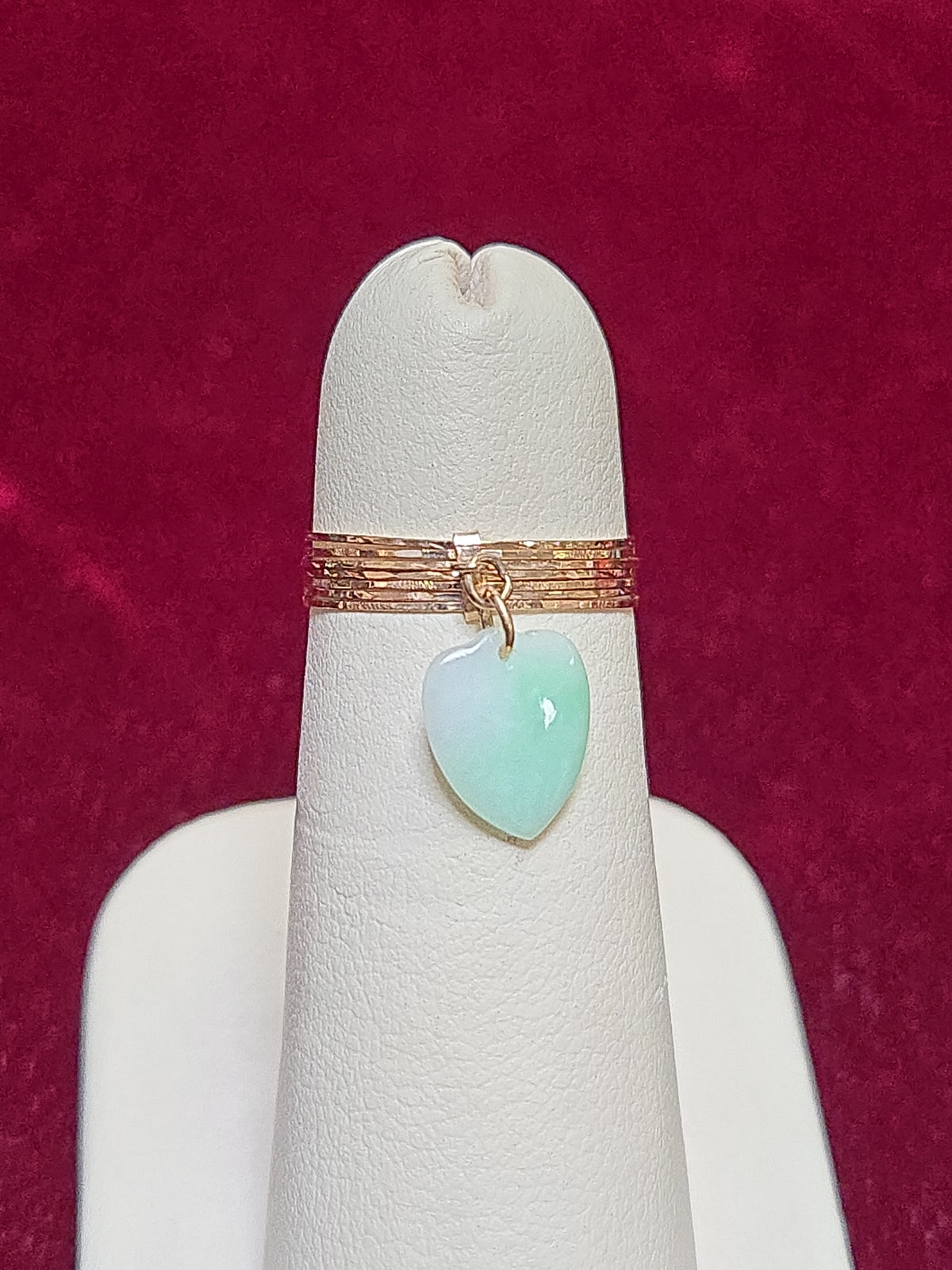 14K rose gold charm ring with pear-shaped jade gemstone, featuring delicate design by Chique Jewelry.