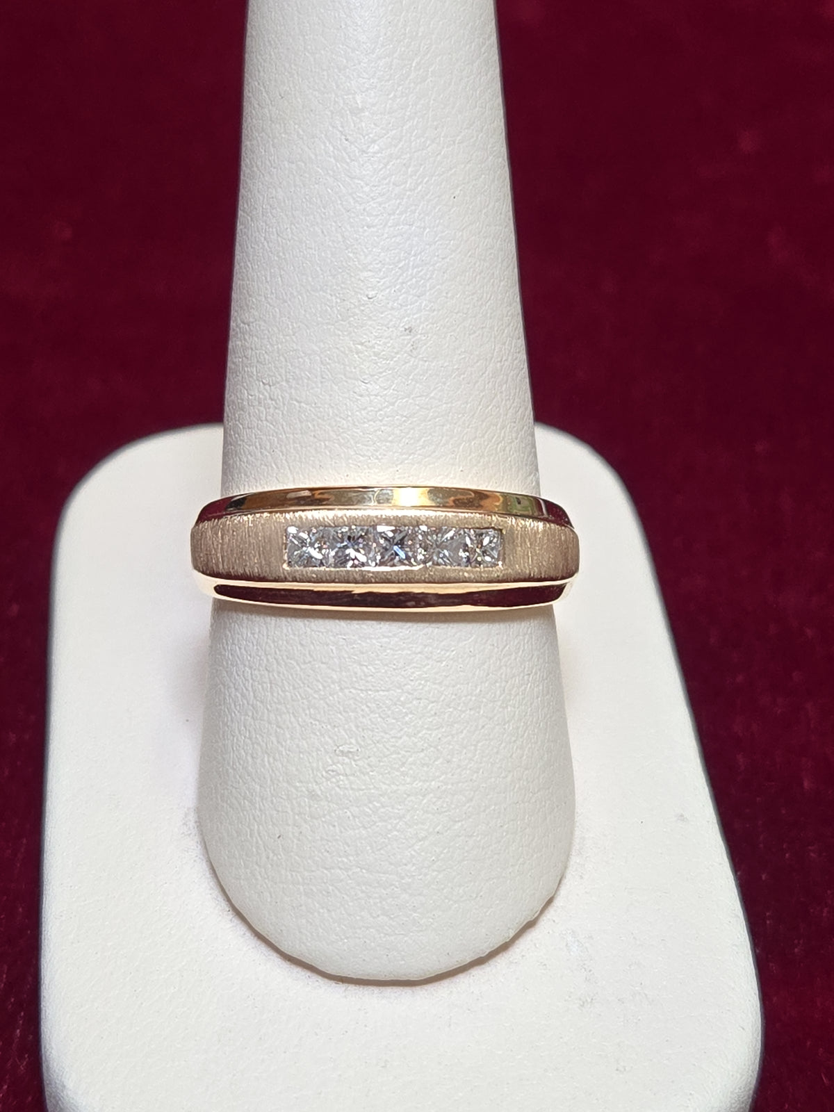 14K gold ring with 0.5ct princess-cut diamond, elegant jewelry piece from Chique Jewelry, showcasing the sparkling gemstone.