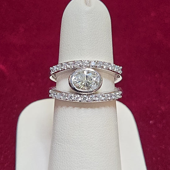 14K white gold ring featuring a 1.04ct oval diamond from Chique Jewelry, showcasing elegant craftsmanship and sparkling gemstone.