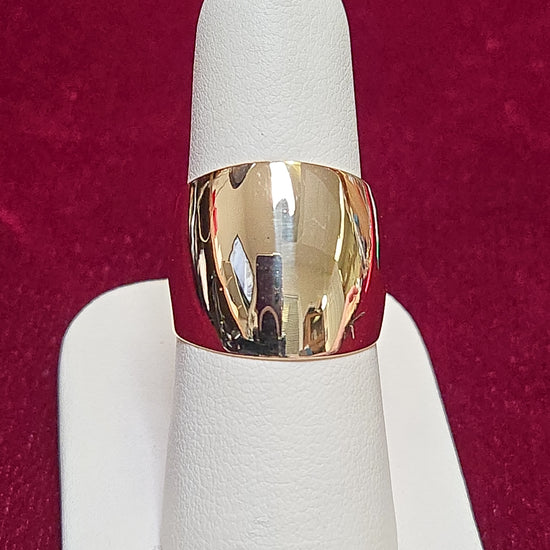 14K gold ring with intricate design, weighing 7.1 grams, from Chique Jewelry, showcasing elegant craftsmanship.
