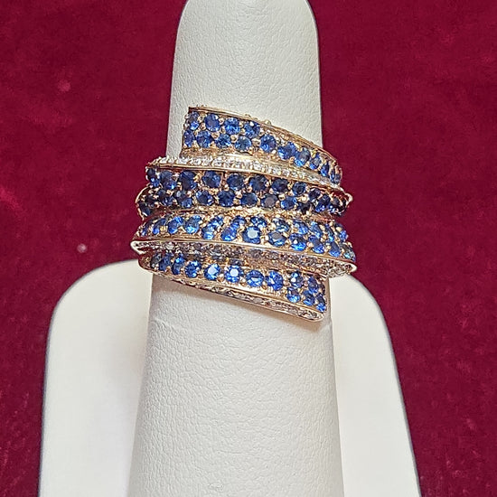 14K gold cocktail ring with 2ct round blue sapphire, featuring elegant design and shiny gold band from Chique Jewelry.