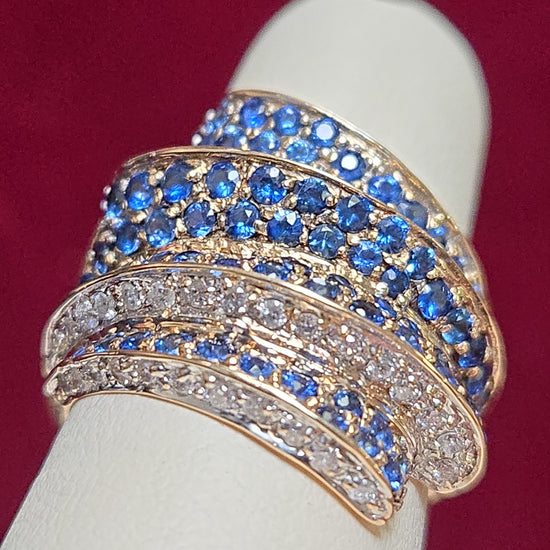14K gold cocktail ring with 2ct round blue sapphire, featuring elegant design and shiny finish, by Chique Jewelry.