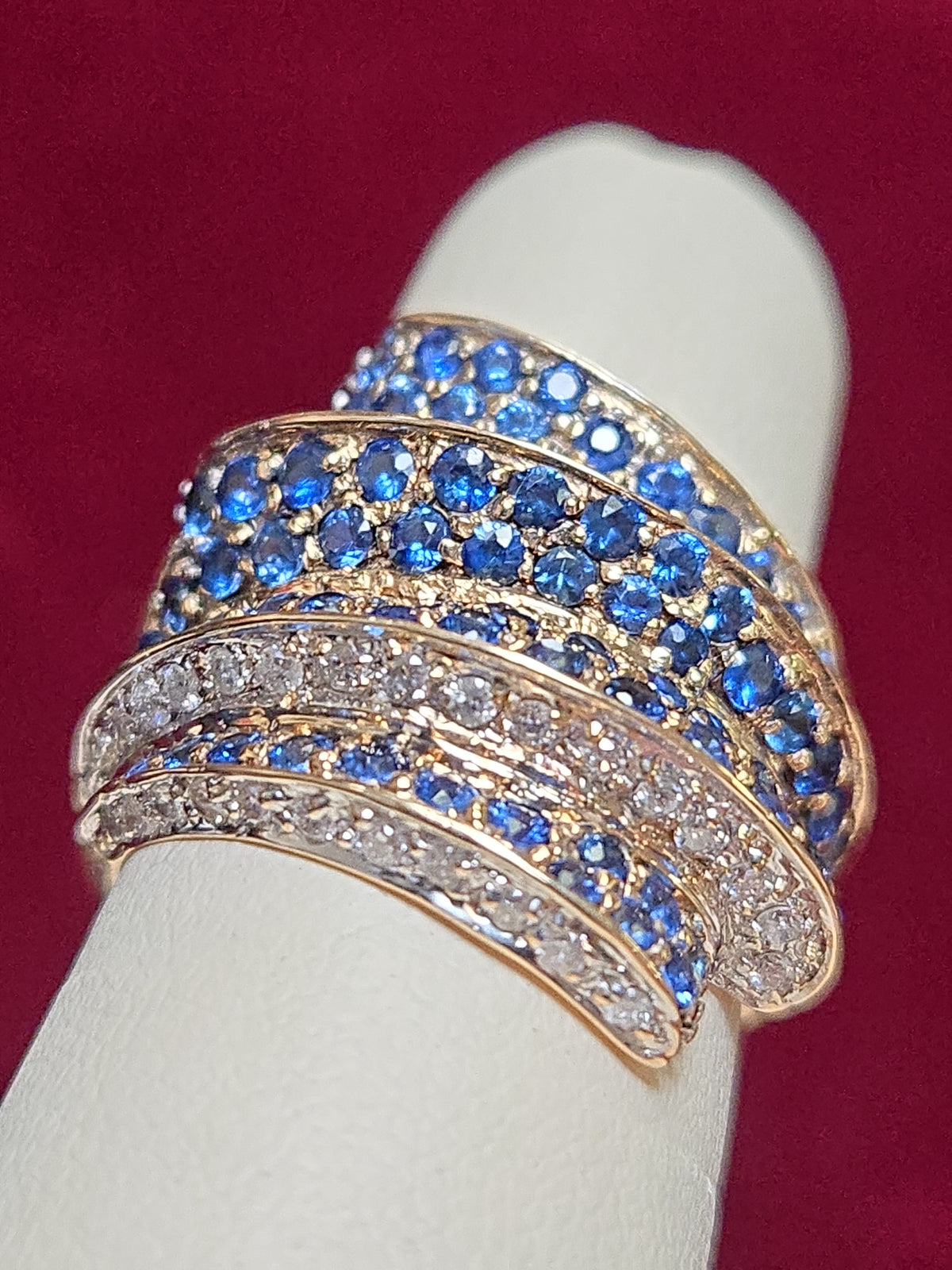 14K gold cocktail ring with 2ct round blue sapphire, featuring elegant design and shiny finish, by Chique Jewelry.