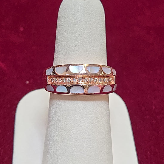 14K rose gold ring with 0.2ct round diamond, crafted by Chique Jewelry, showcasing elegant jewelry design.