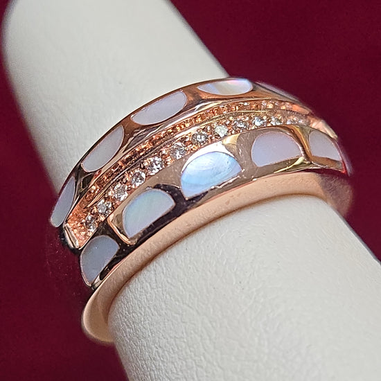 14K rose gold ring with a 0.2ct round diamond, crafted by Chique Jewelry, featuring an elegant design and polished finish.