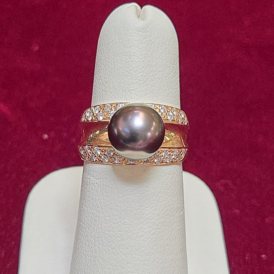 14K gold ring with round black pearl, elegant jewelry piece weighing 7.2 grams, from Chique Jewelry.