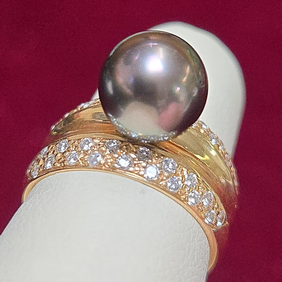14K gold ring with a round black pearl, weighing 7.2 grams, crafted by Chique Jewelry.