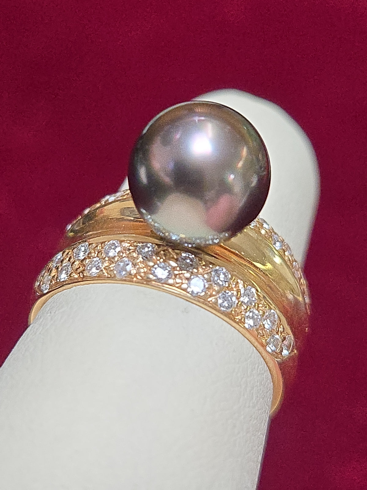 14K gold ring with a round black pearl, weighing 7.2 grams, crafted by Chique Jewelry.