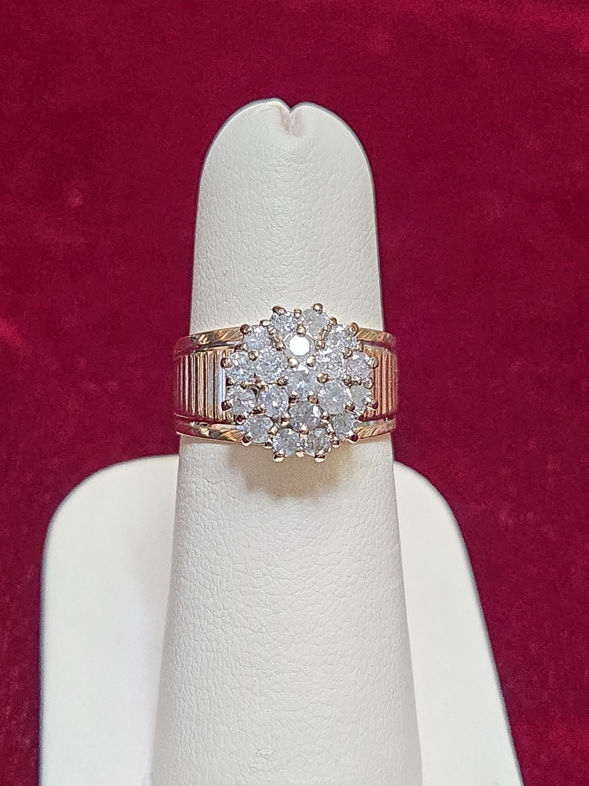 14K gold cluster ring with 0.75ct round diamonds from Chique Jewelry, featuring a stylish design and 5.9g weight.