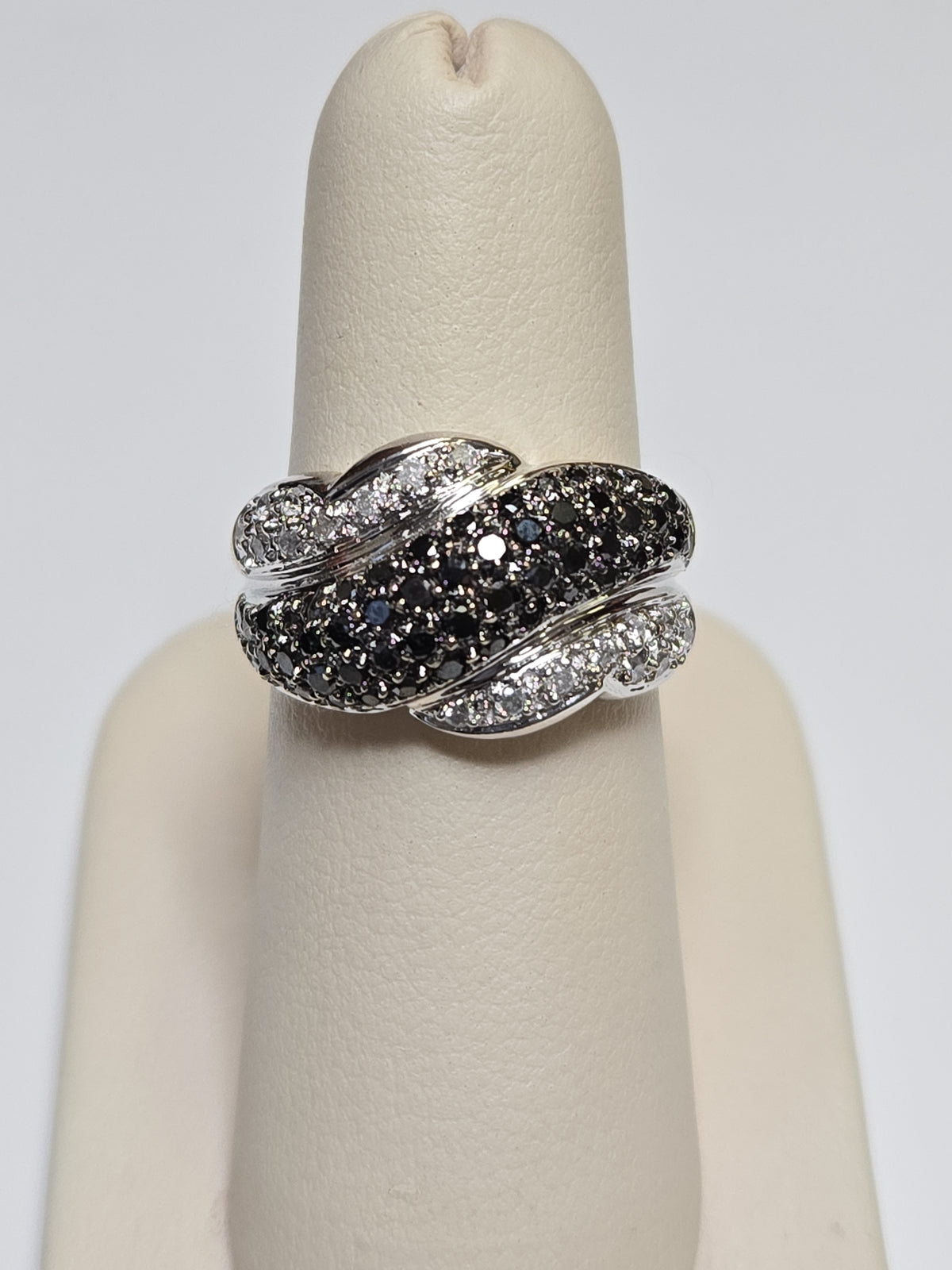 14K white gold ring with 0.8ct round black diamonds, designed by Chique Jewelry, showcasing a elegant jewelry piece.