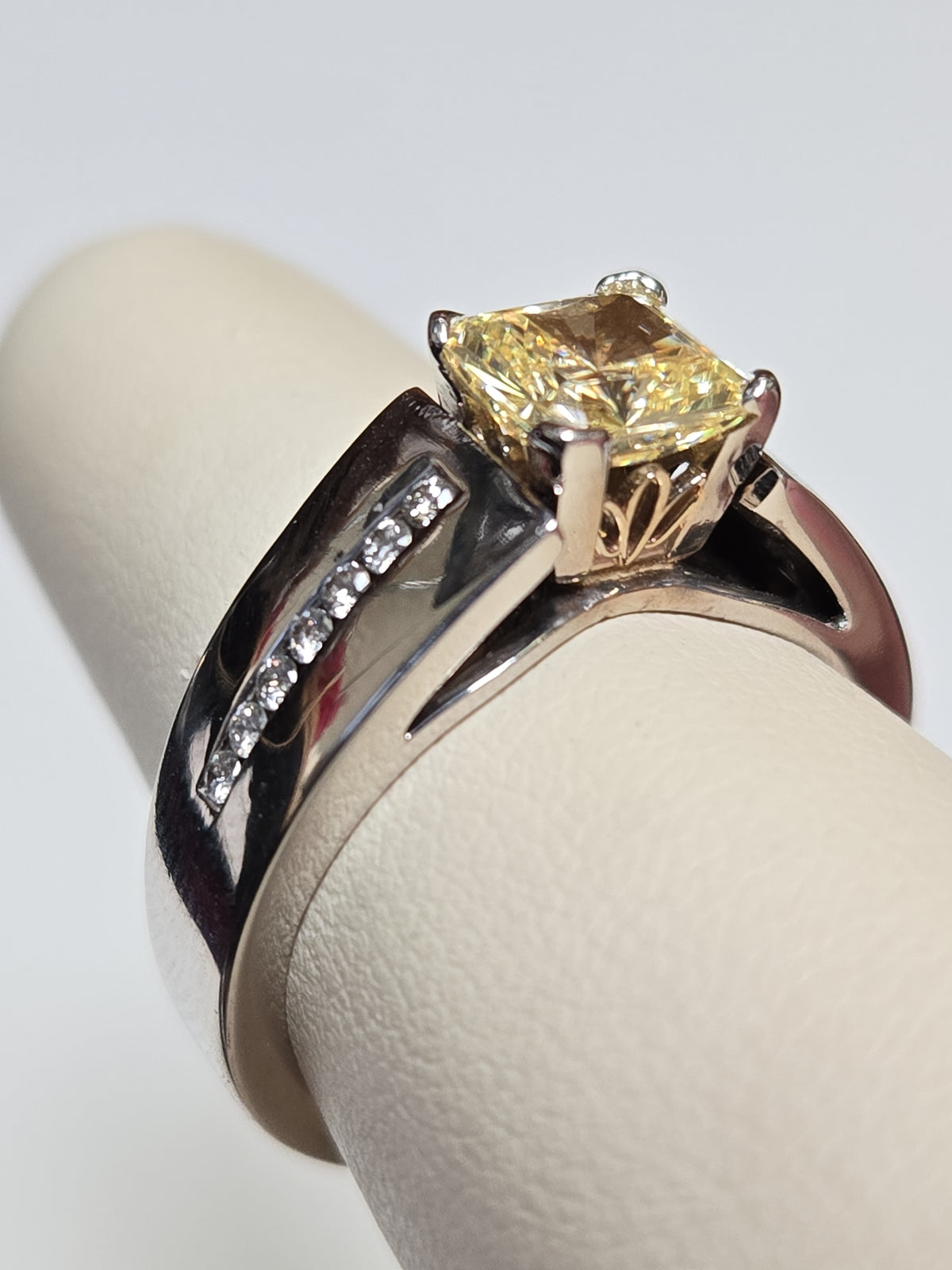 14K white gold ring with princess-cut simulated Lannyte diamond, featuring a sleek design and sparkling gemstone.