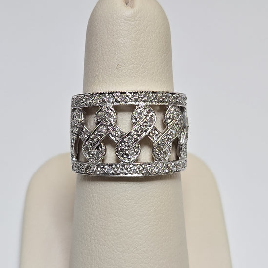 14K white gold ring with 0.5ct round diamonds, elegant jewelry piece from Chique Jewelry, showcasing a sparkling gemstone design.